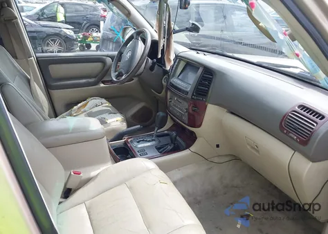 2004 Toyota Land Cruiser z USA, uszkodzony, nr VIN JTEHT05J542064973